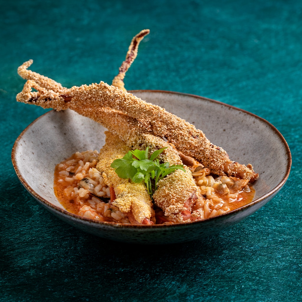 Tentáculos de Pota fritos com arroz de marisco