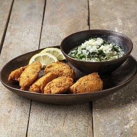 Pastéis de bacalhau com arroz de grelos