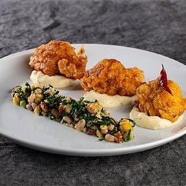 Sonhos de bacalhau, migas e maionese composta